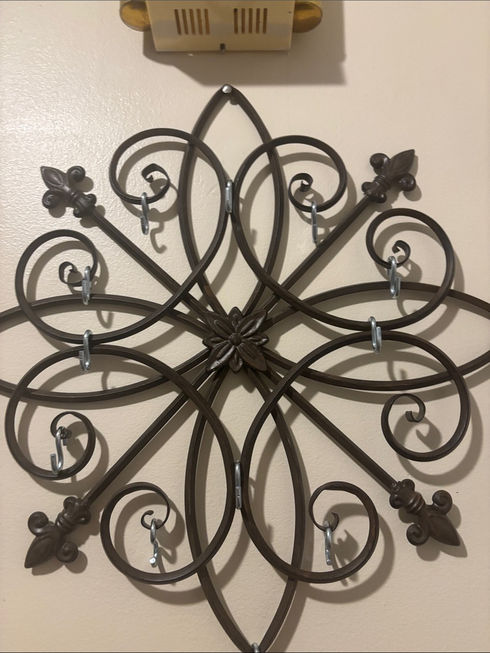 Decorative metal wall hanging jewelry holder
